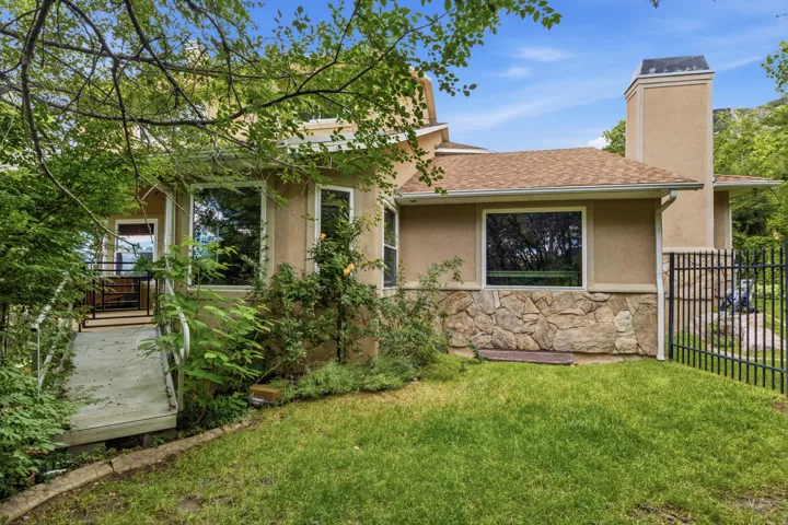 Stucco exterior with stone accent detailing