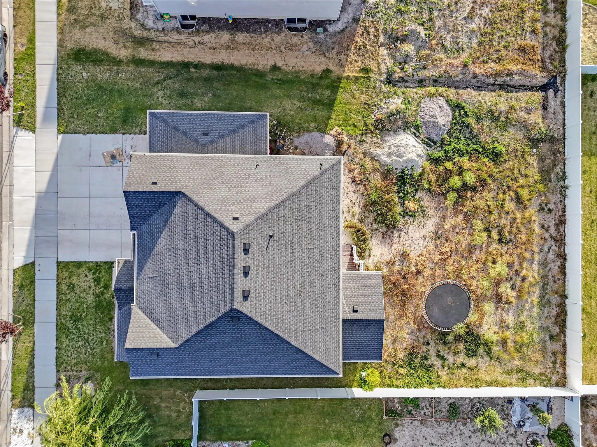 Single-family residence featuring an asphalt shingle roof