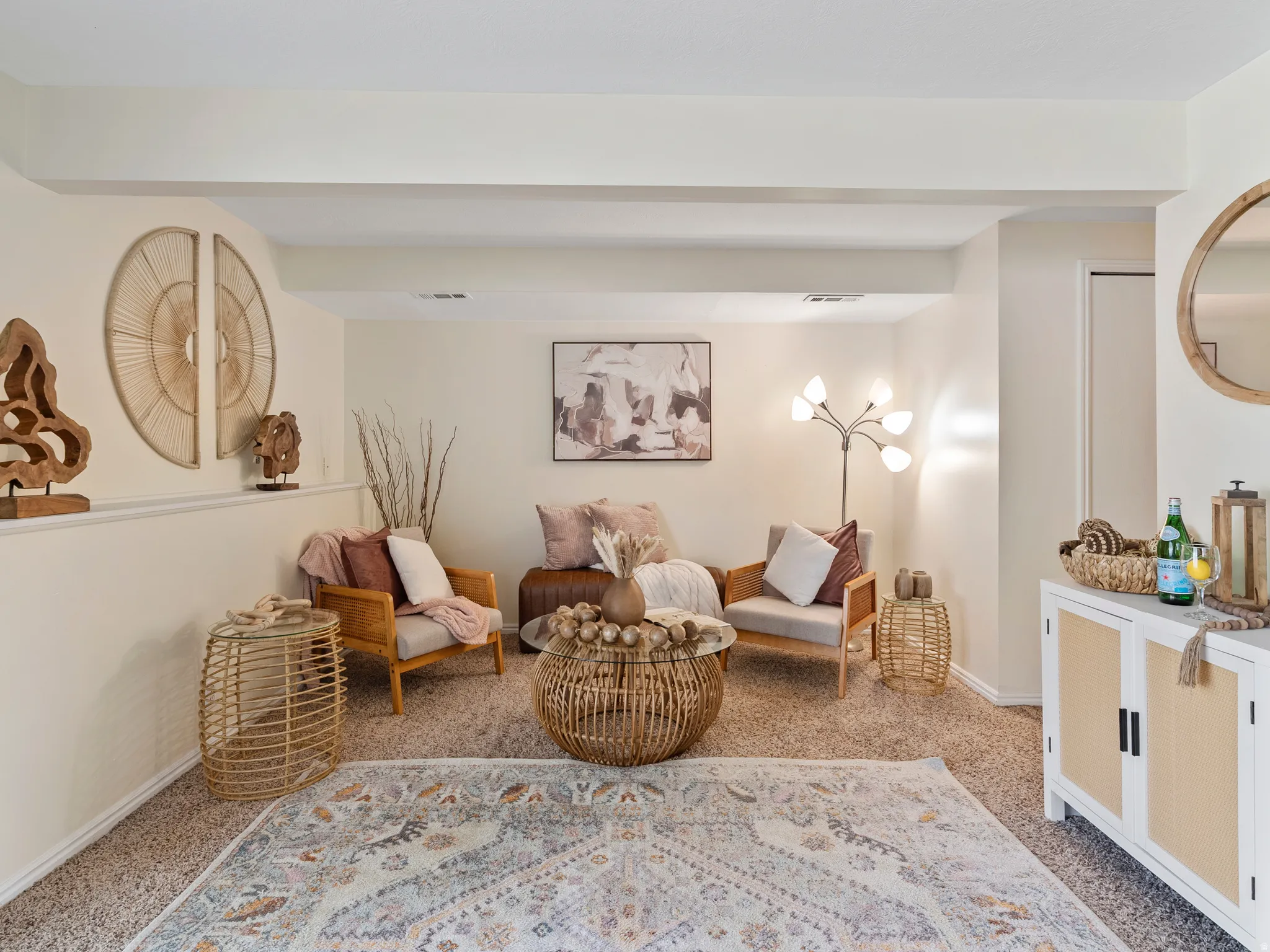 Carpeted recreation area featuring recessed lighting, a built-in wall shelf, and a painted door