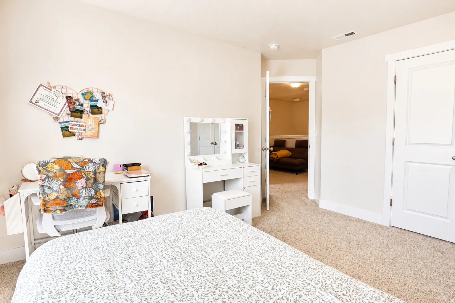 Neutral-toned carpeting throughout