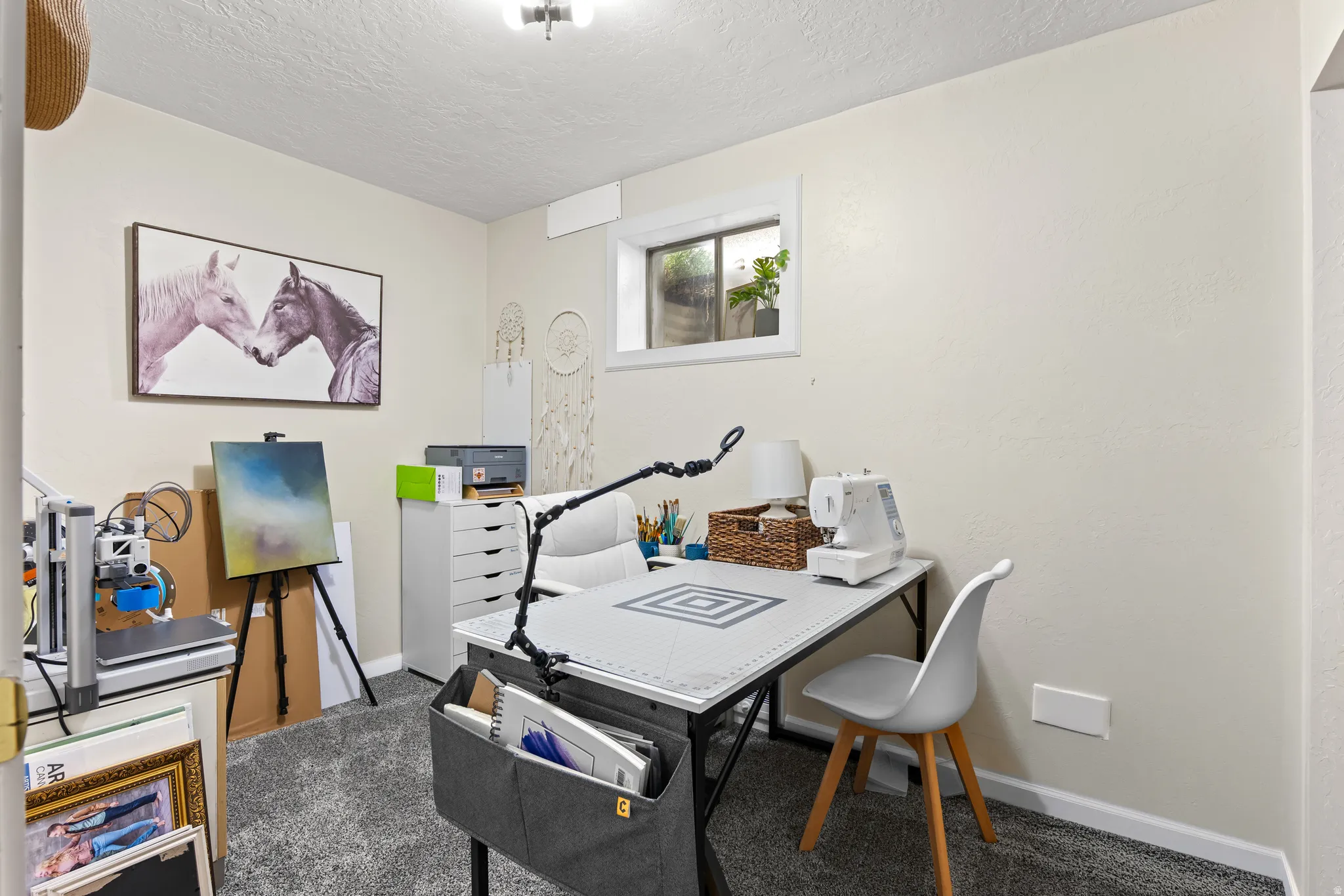 Recessed window with white trim, light-colored walls, and textured carpeting