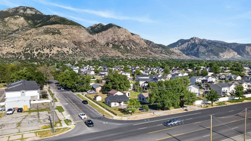 Residential neighborhood set against a mountainous backdrop