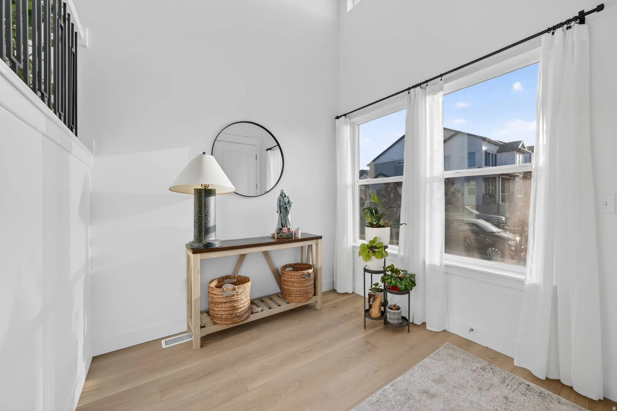 High ceilings complemented by large windows with white trim