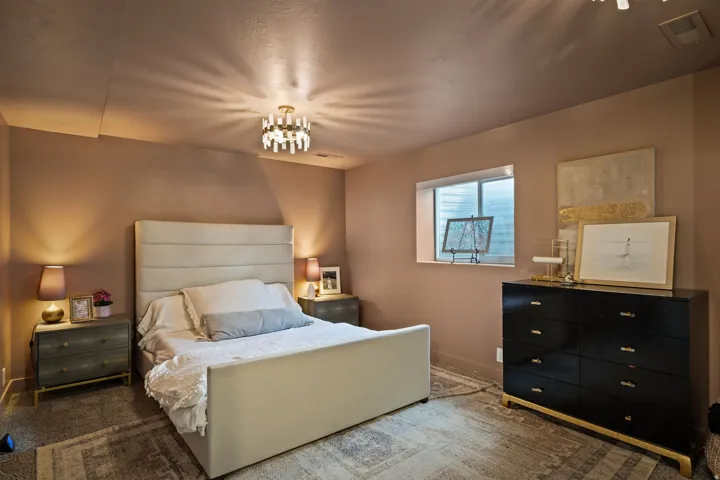 Recessed window framing, textured ceiling, and neutral wall paint