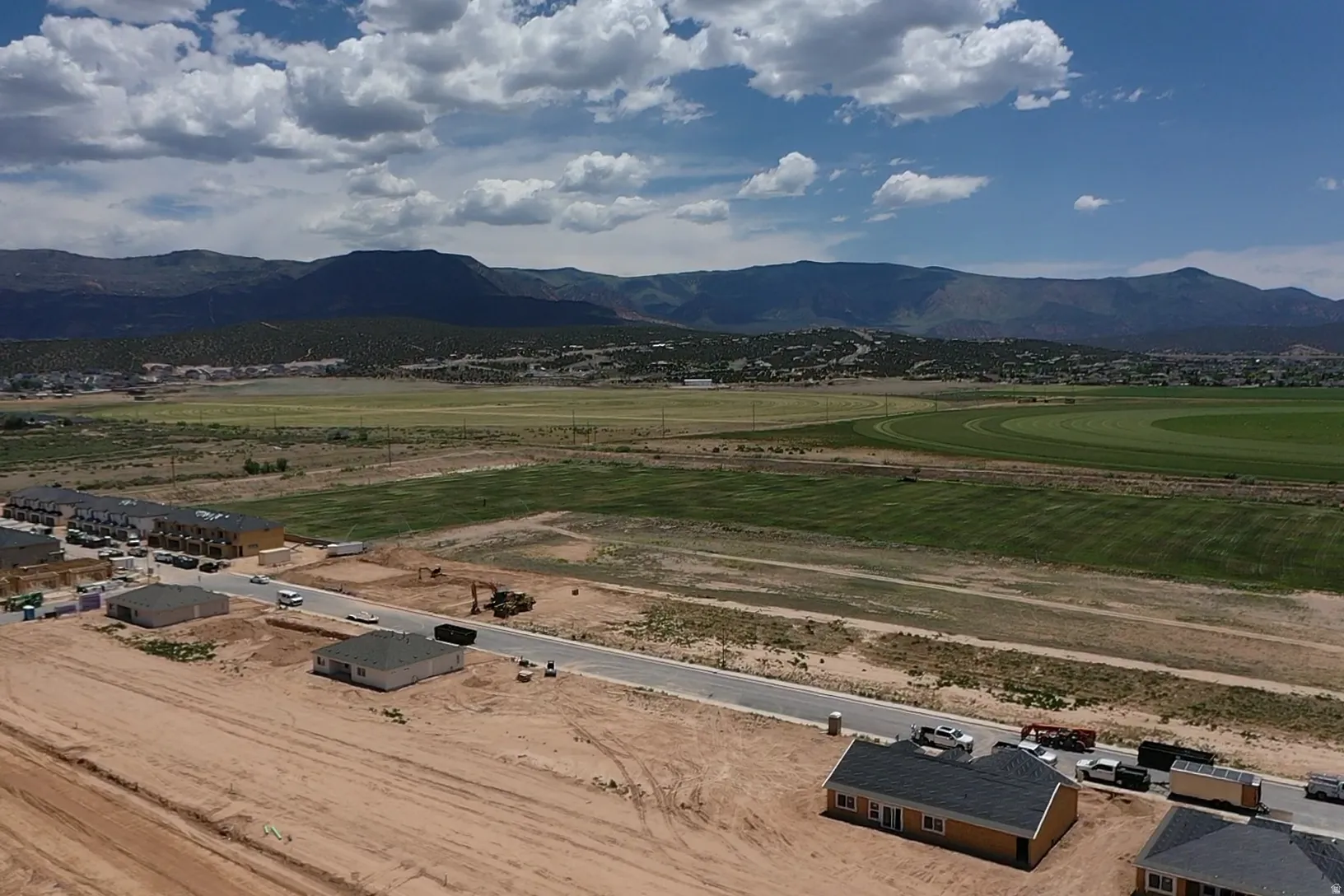 Developing residential area with numerous new construction homes and building sites