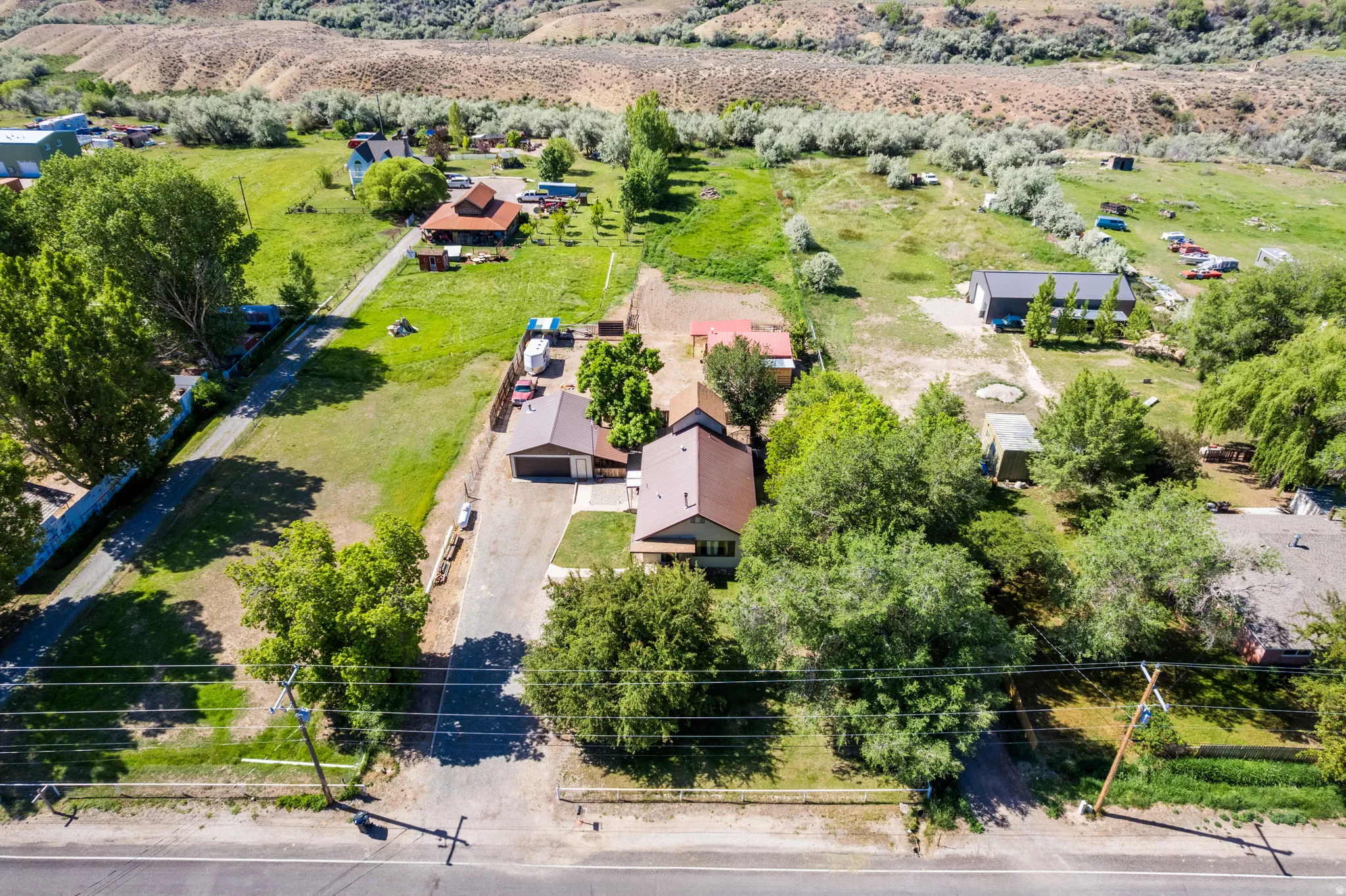 Aerial perspective showcasing multiple structures and expansive grounds