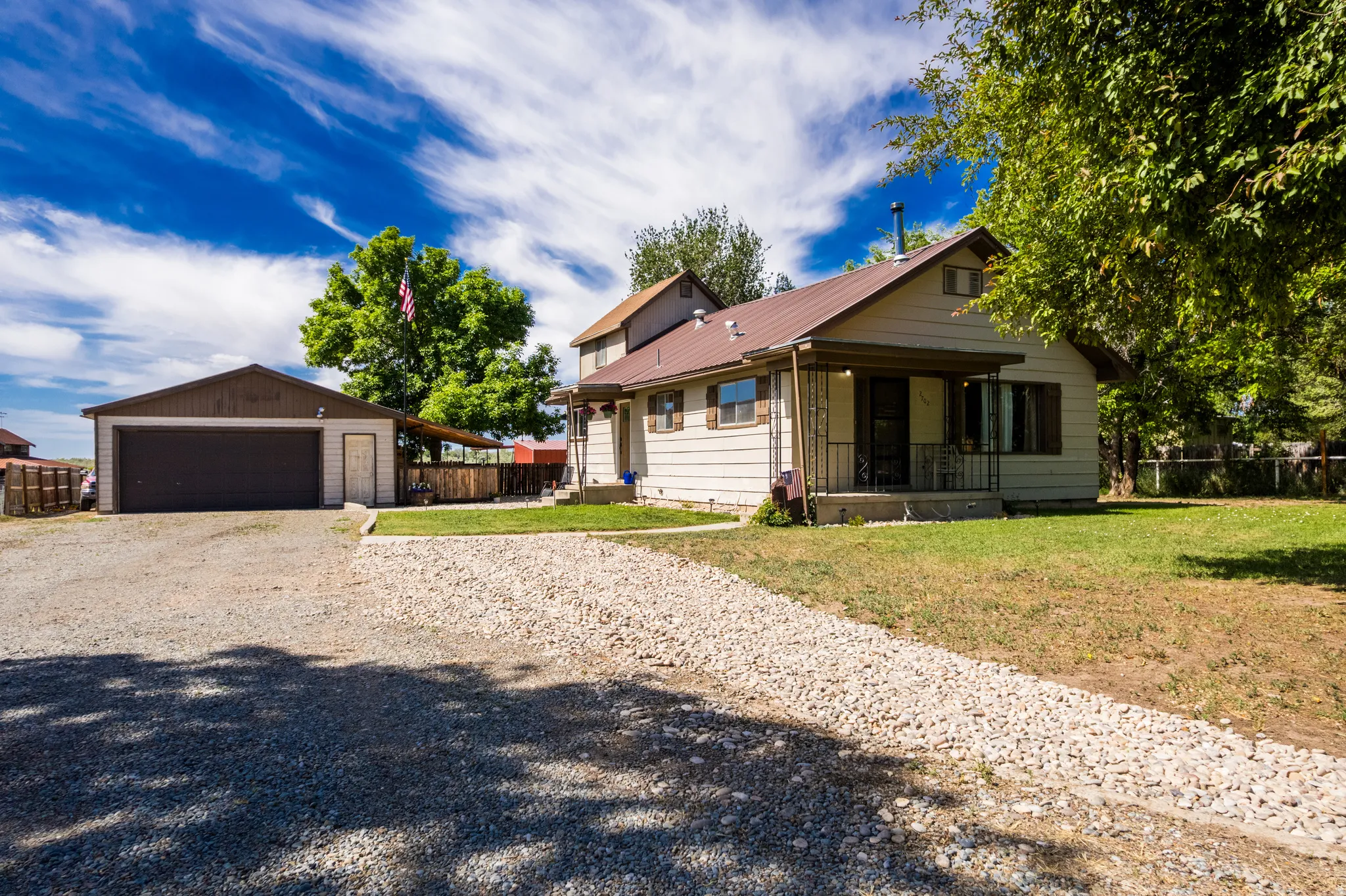 Detached two-car garage with a side entry door