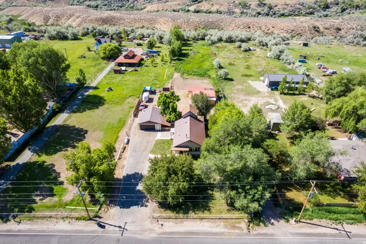 Aerial perspective showcasing multiple structures and expansive grounds