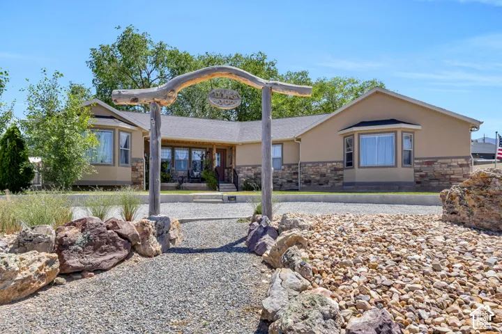 Stucco exterior with stone veneer accents