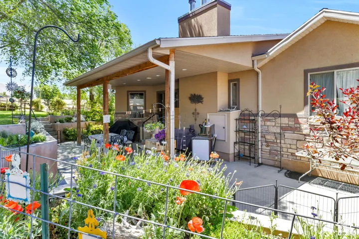 Covered patio featuring a concrete surface and wood columns