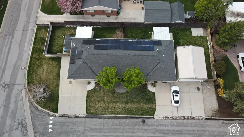 Gable roof featuring multiple solar panel arrays