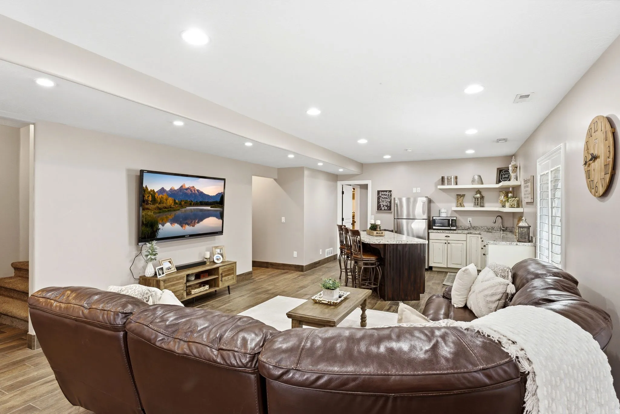 Open-concept living area showing kitchenette