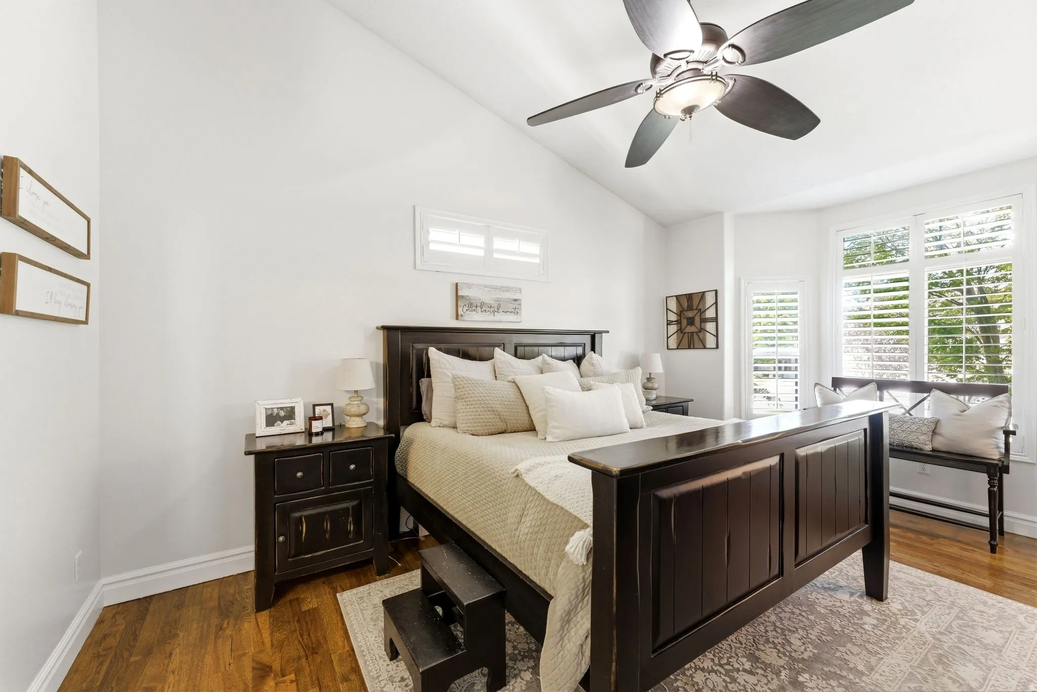 Primary Bedroom featuring vaulted ceilings