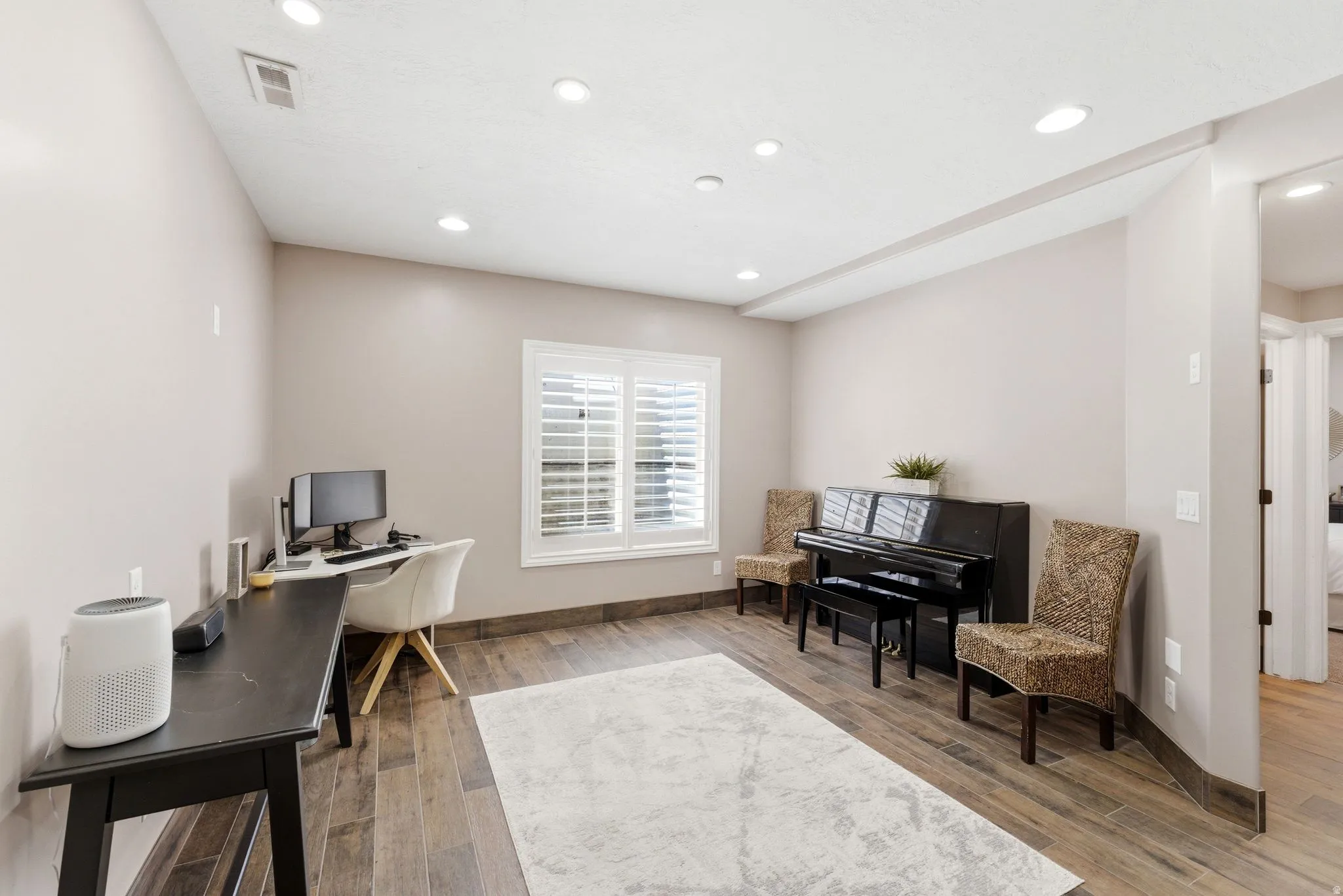 Spacious basement flex space adjacent to living room