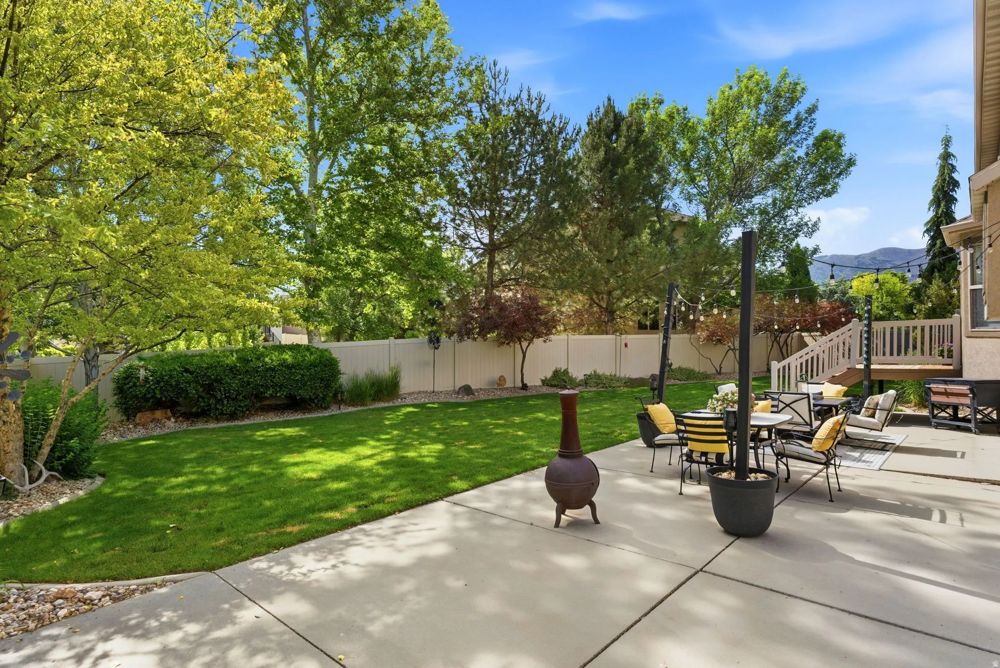 Patio featuring with dining area and backyard