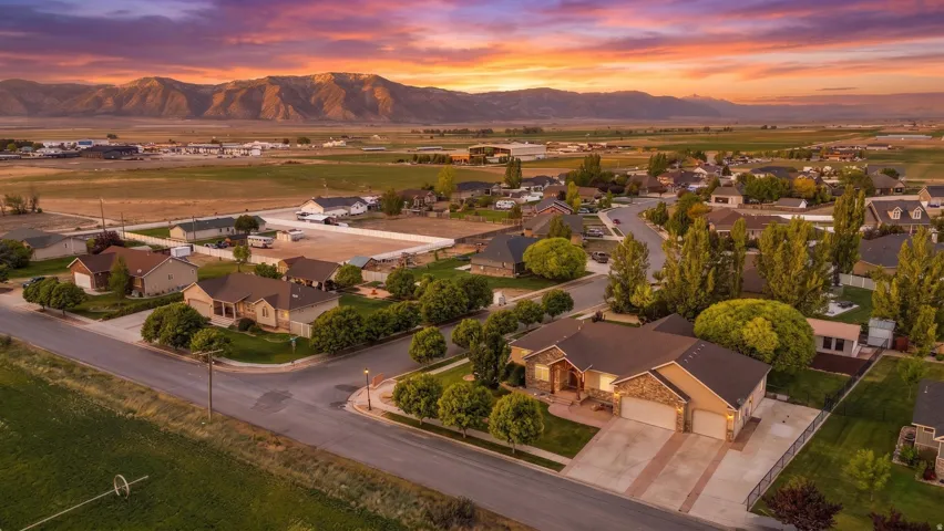 Expansive mountain backdrop framing a residential neighborhood