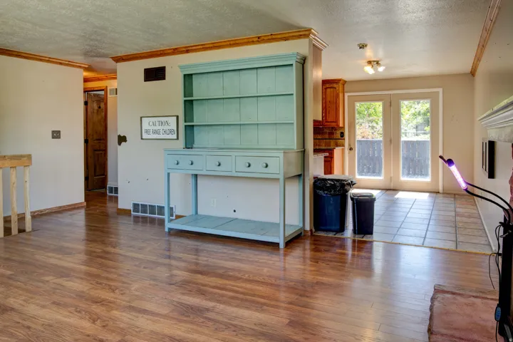 Wood-finish flooring throughout the main living area