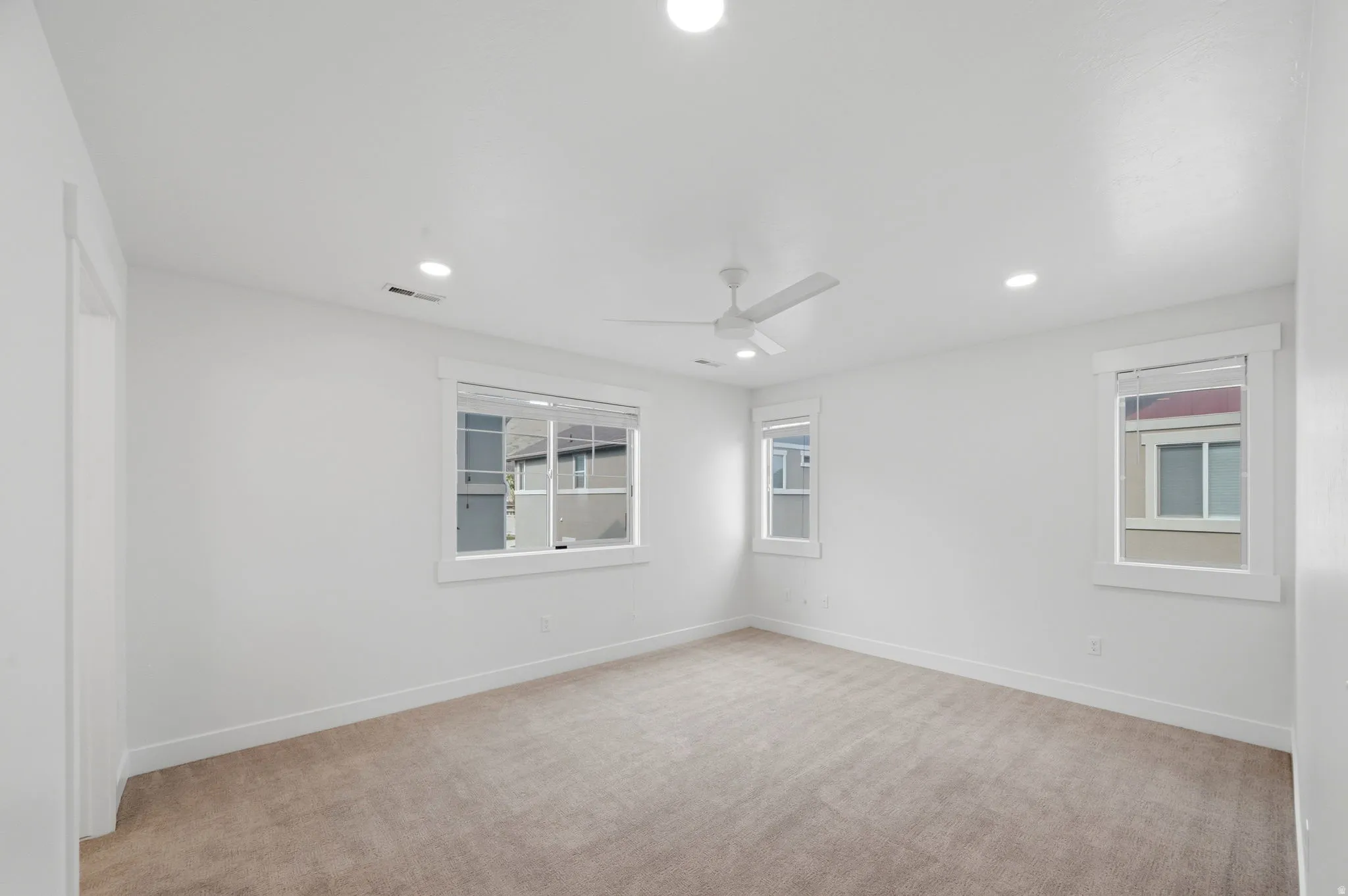 Spacious Master Bedroom featuring recessed lighting, and a ceiling fan