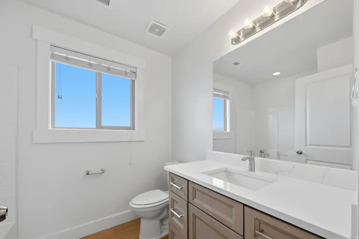 Main upstairs Contemporary bathroom vanity with Quarts countertop and undermount sink