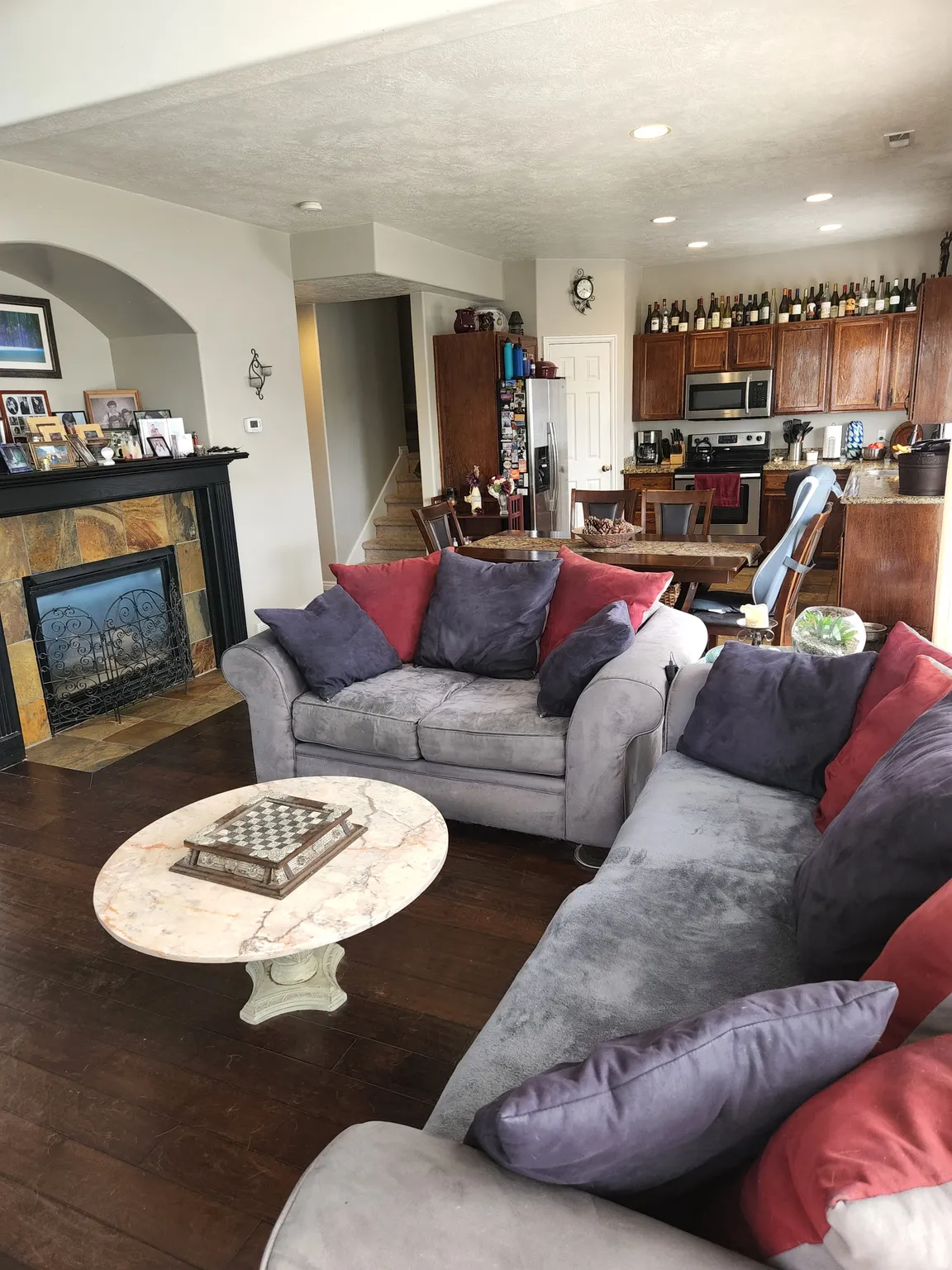 Open-concept living space featuring wood-finish flooring