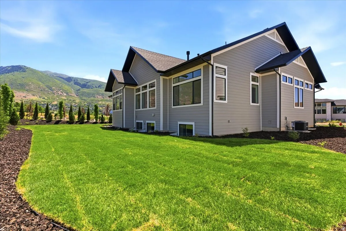 Fully landscaped yard with lots of trees for privacy
