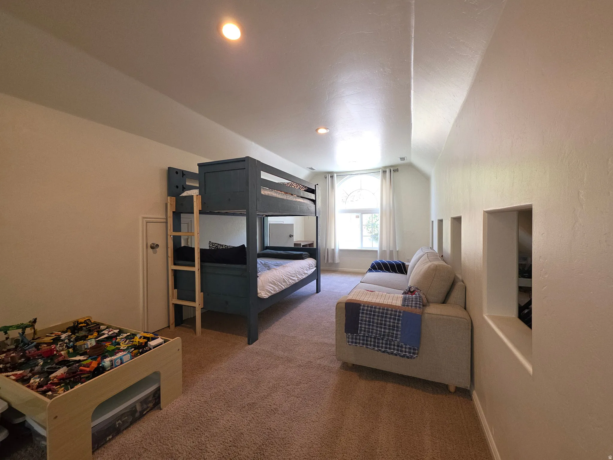 Bedroom #5 Carpeted room with a vaulted ceiling and recessed lighting