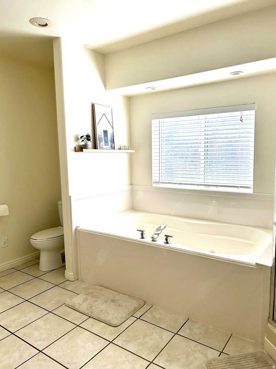 Owner's bathroom featuring jetted tub (separate shower not shown)