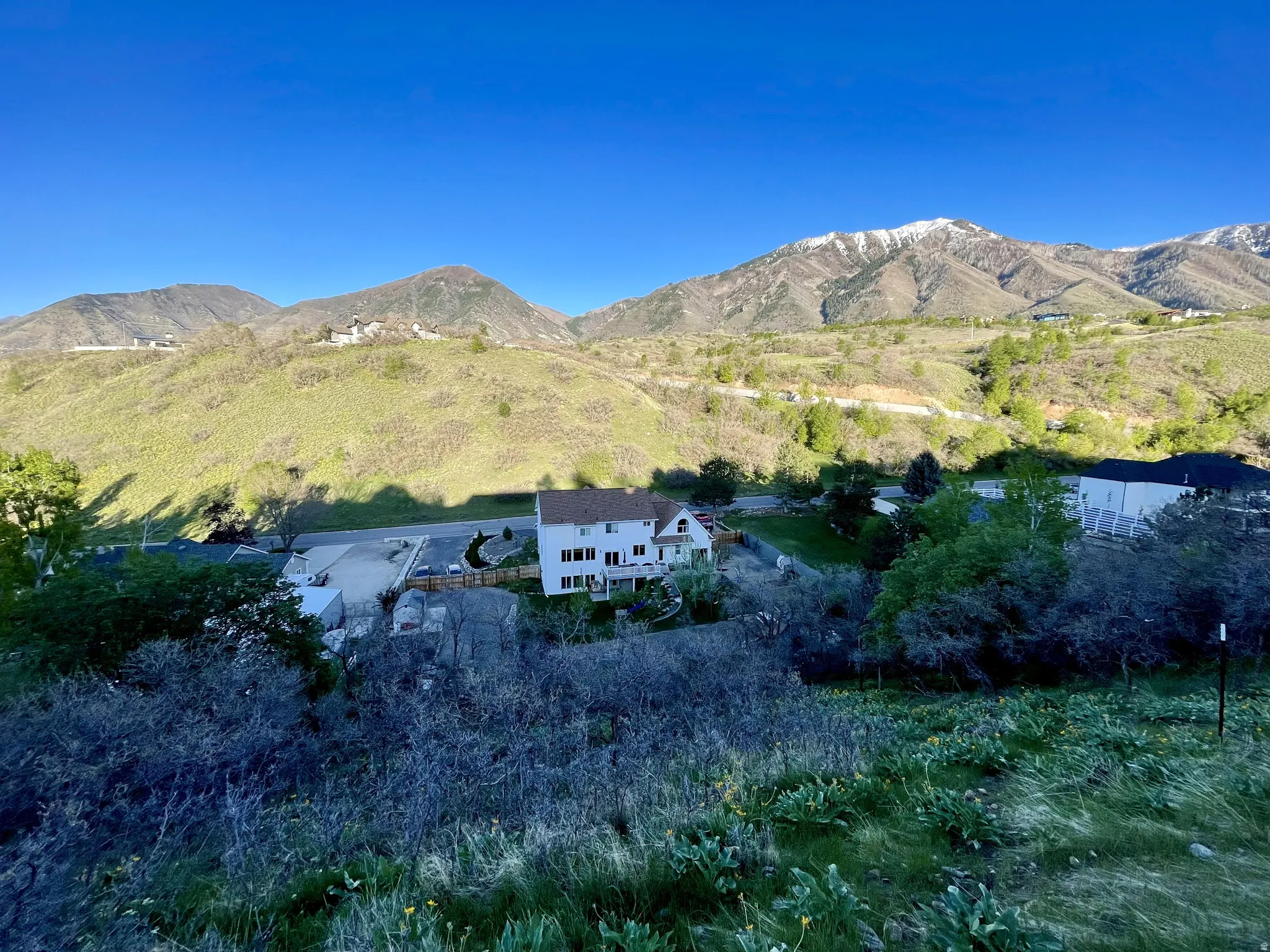 Property situated with mountain backdrops featuring snow-capped peaks