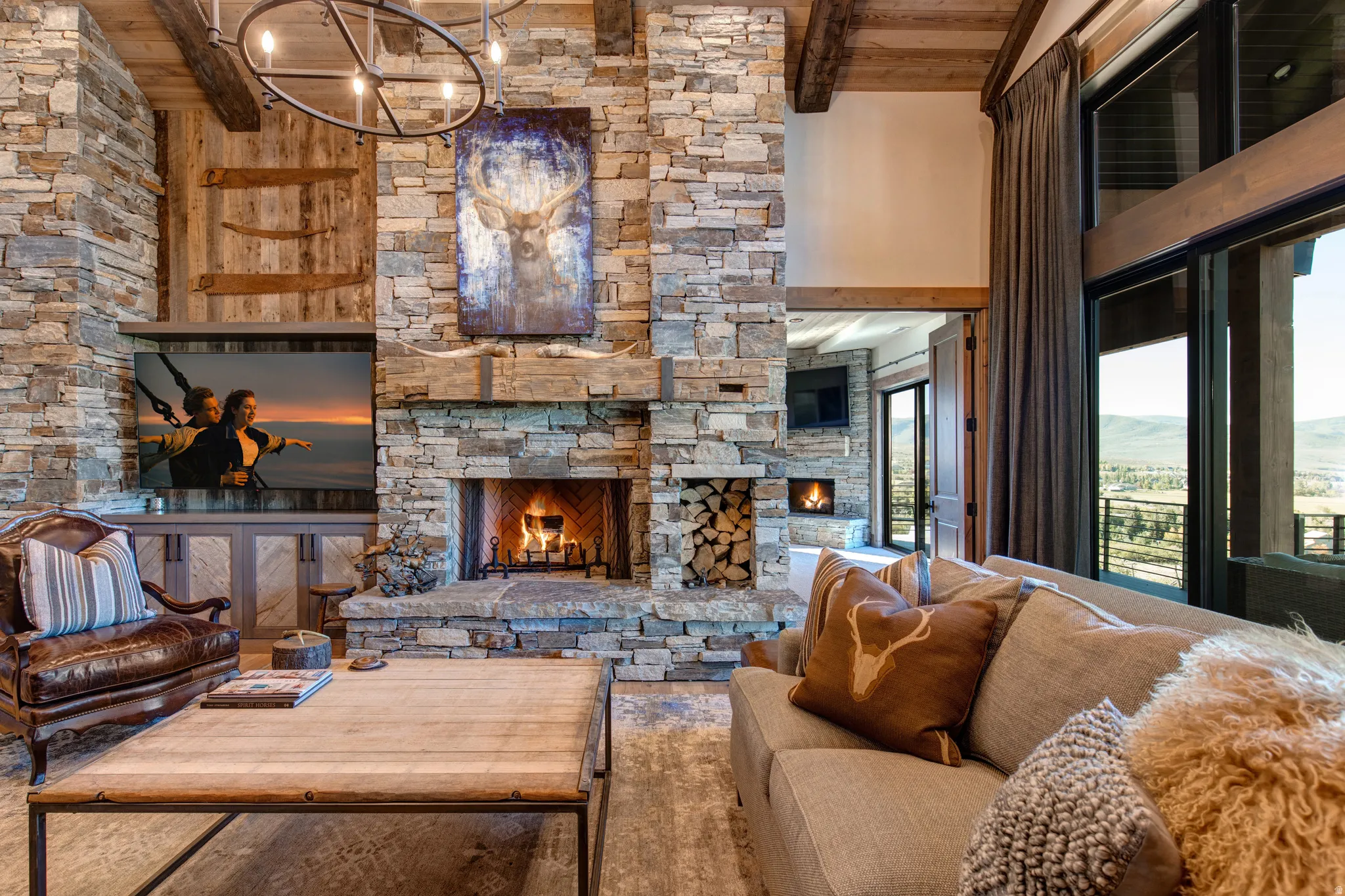 Stone-clad fireplace with integrated wood storage