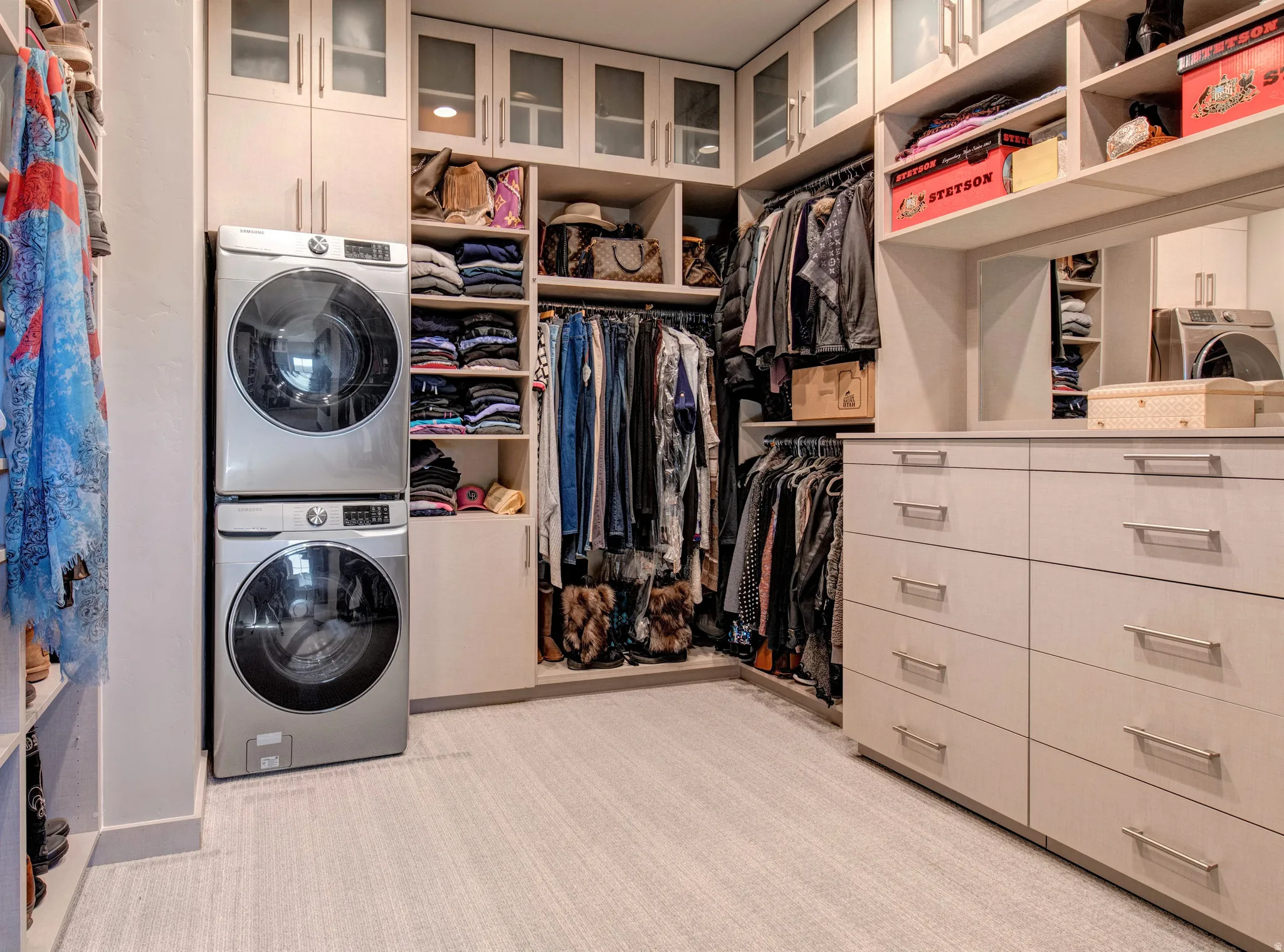 Built-in custom closet system featuring multiple storage options