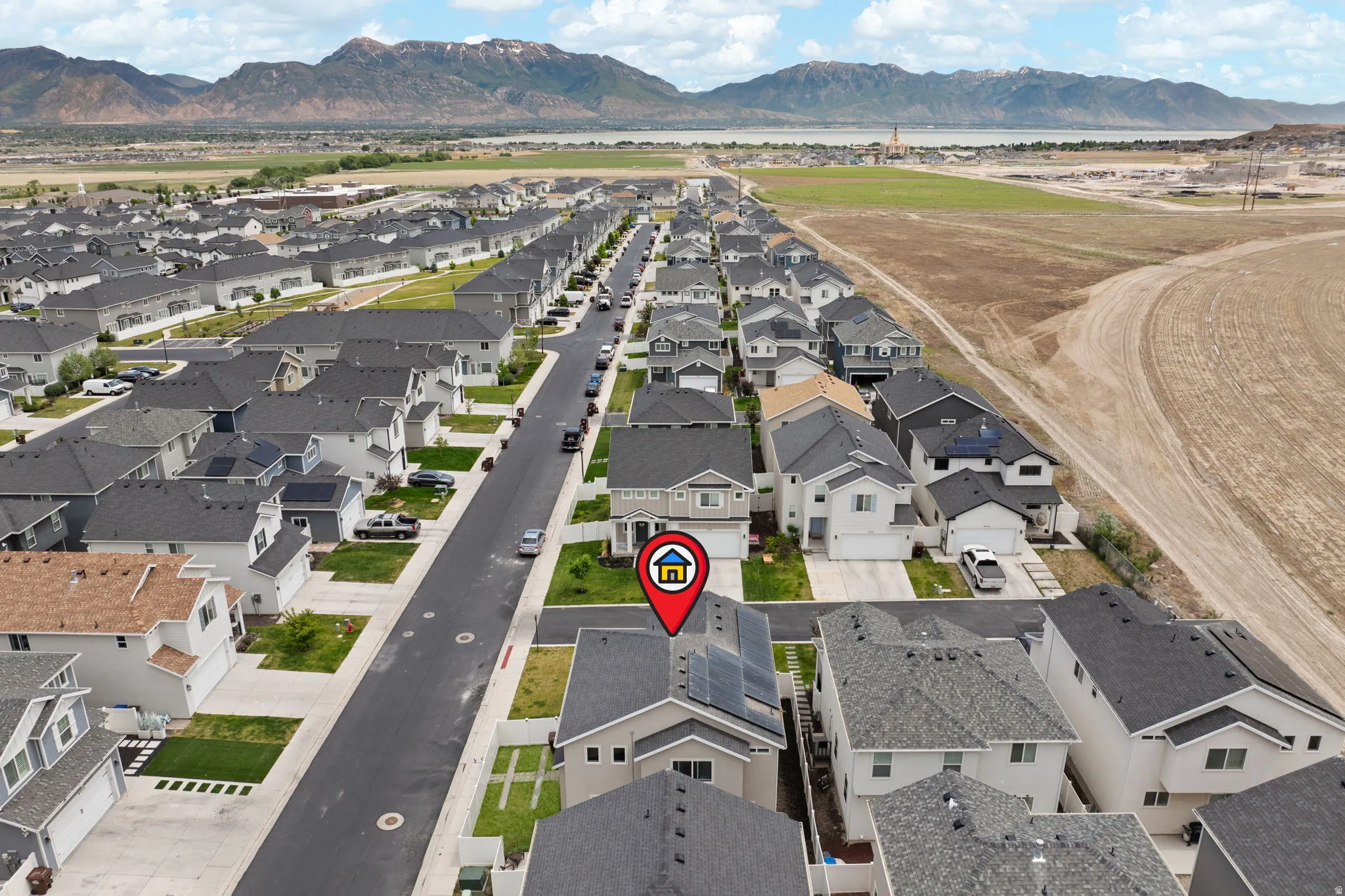 Aerial perspective showcasing a modern residential neighborhood with newly constructed homes