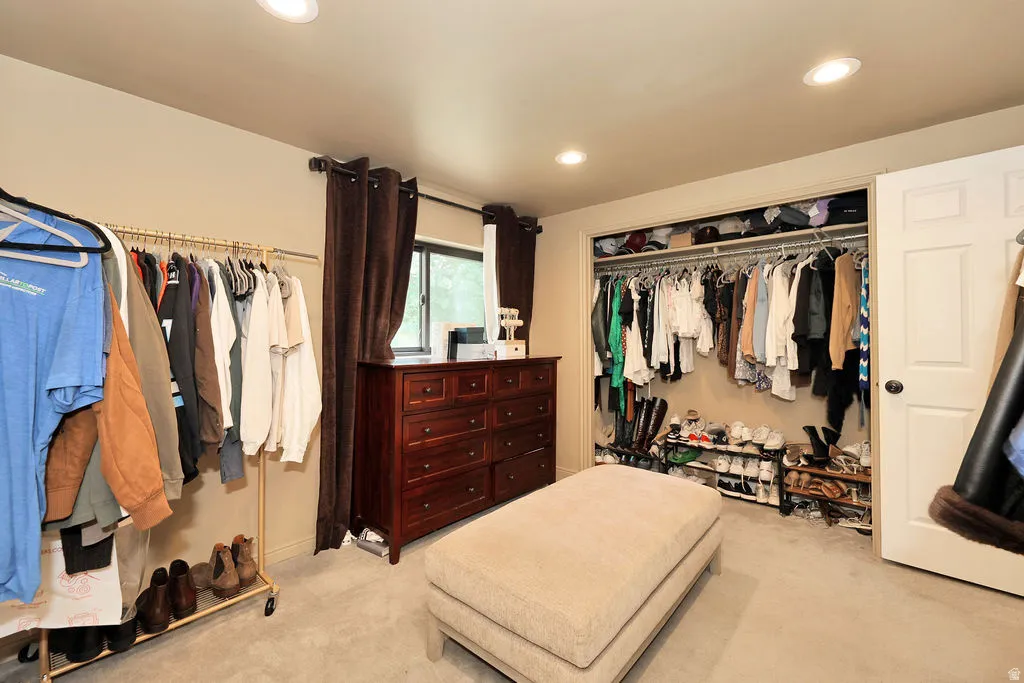 basement bedroom attached to basement family room and ensuit bathroom. currently being used as walk in closet for basement primary suite.