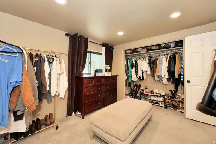 basement bedroom attached to basement family room and ensuit bathroom. currently being used as walk in closet for basement primary suite.