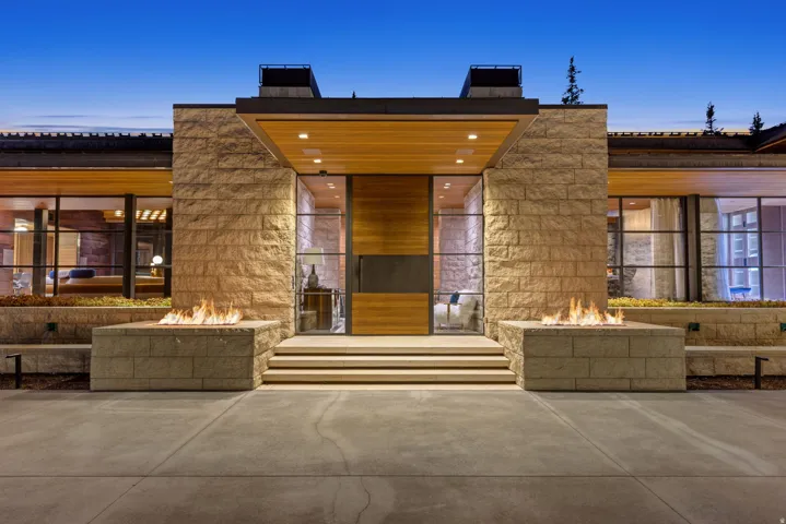 Modern architectural facade featuring stone block construction