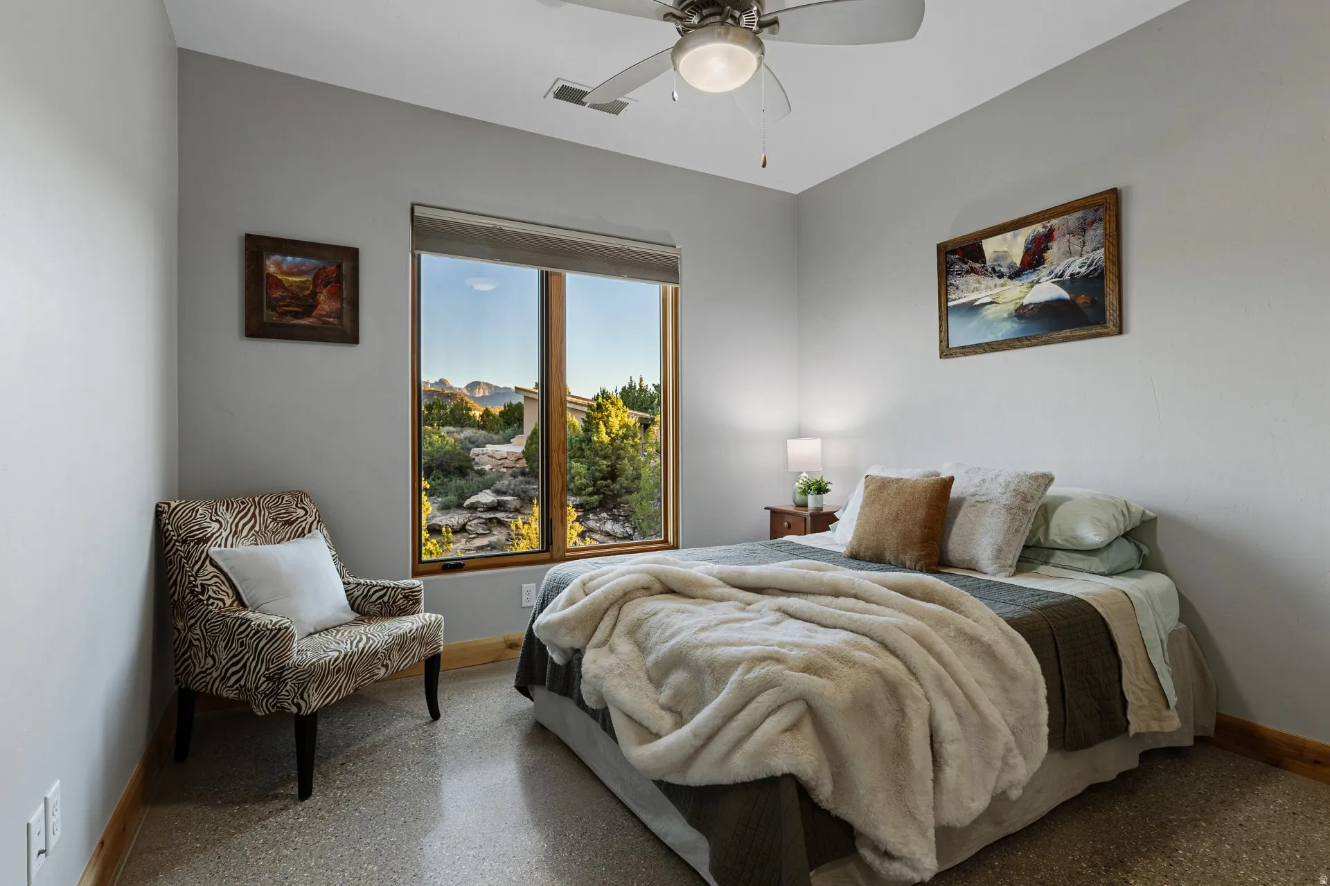 Expansive window framing a mountain landscape