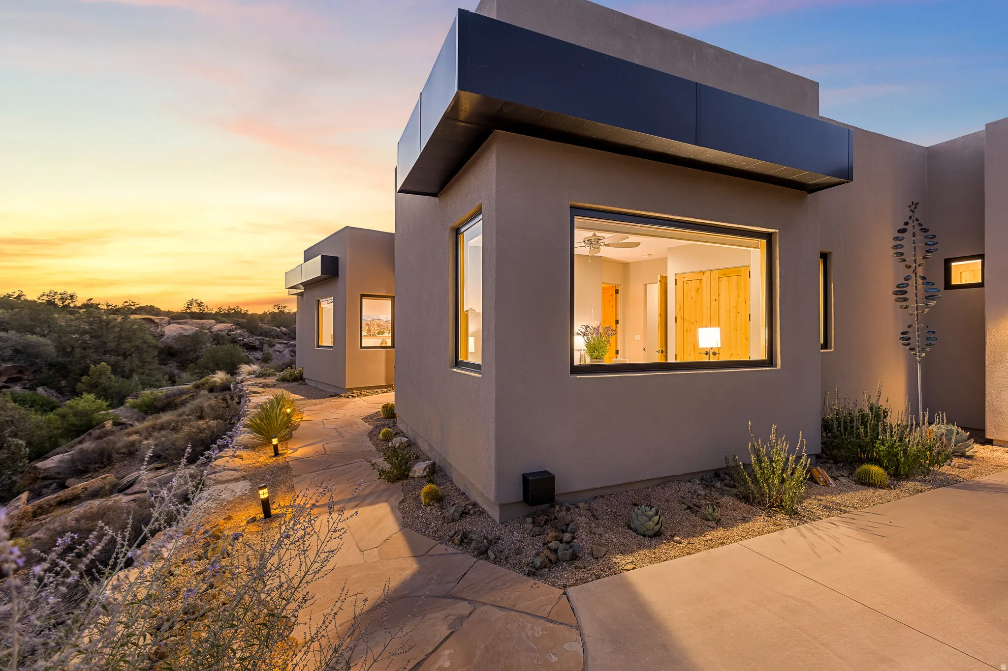 Modern stucco exterior with dark trim accents