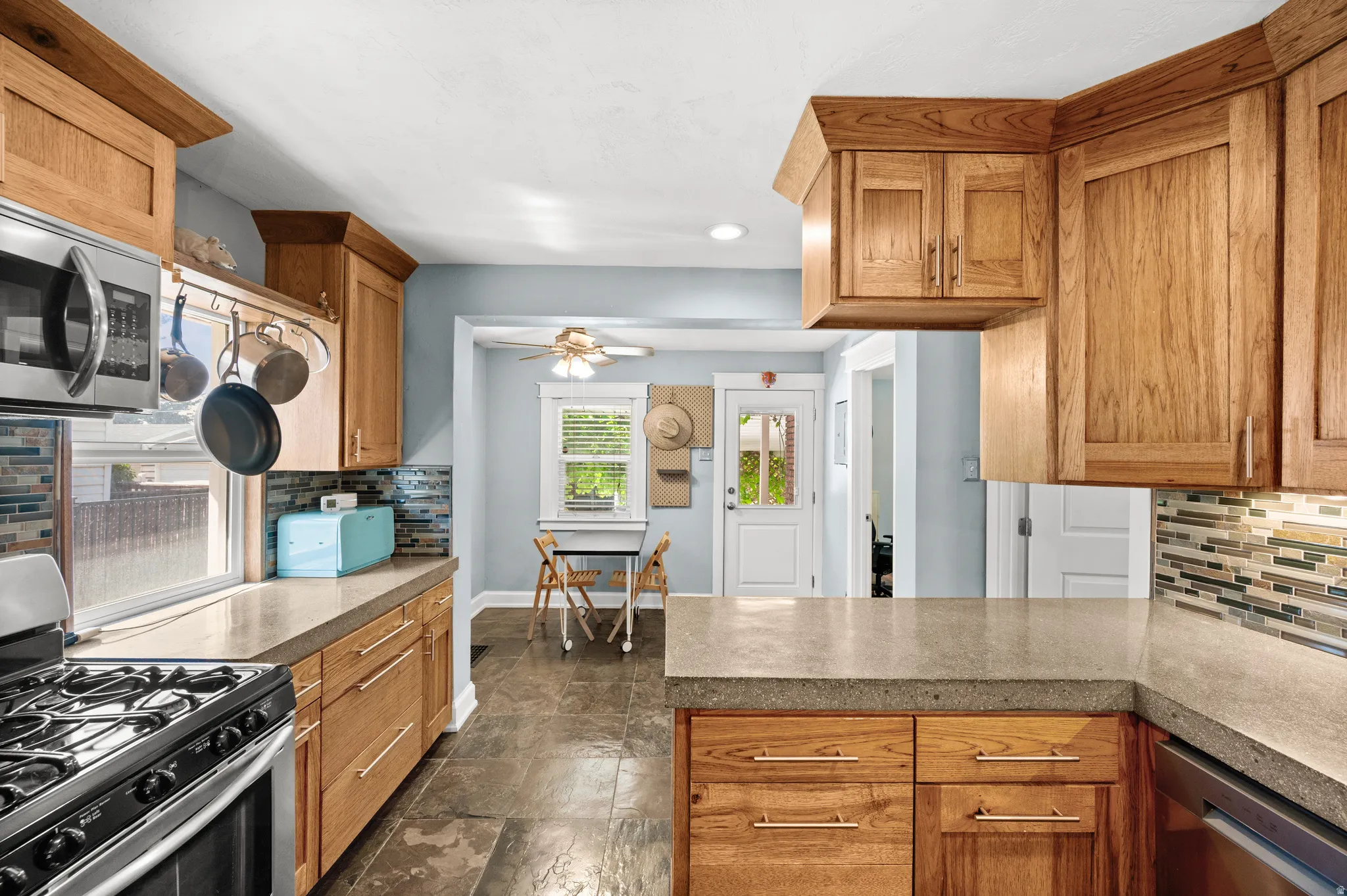 Remodeled kitchen open to the dining area and two bedrooms