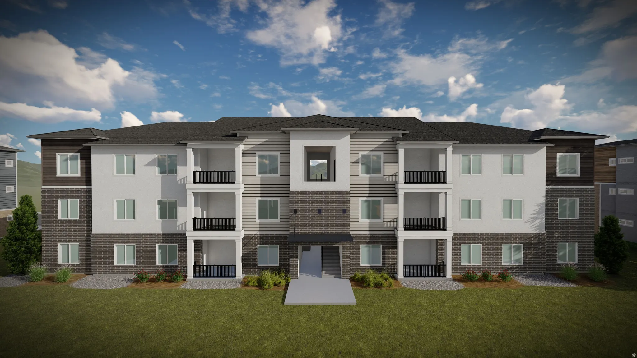 Multi-story building featuring a facade of white siding, dark brick, and horizontal wood-finish panels