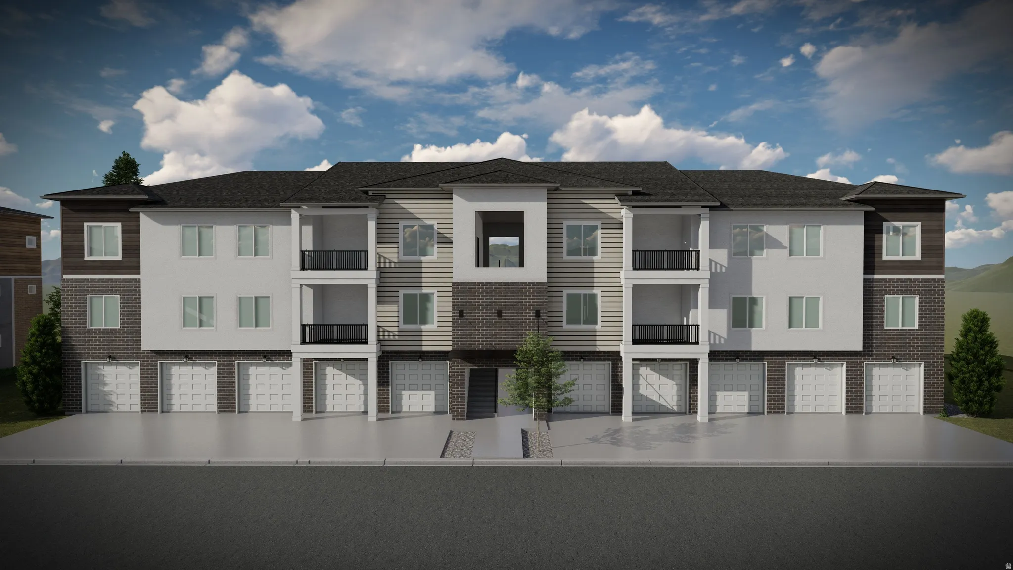Modern multi-story building featuring a facade of white siding, dark brick, and wood-finish accents