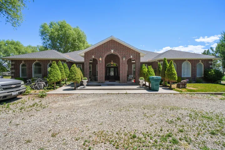 Front of home.  5.6 Acres, 250 plus trees.