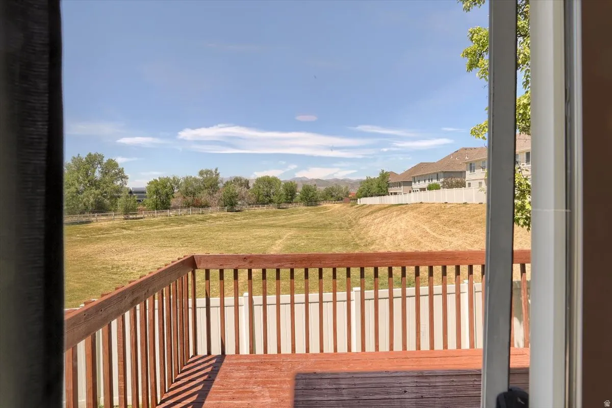 Expansive outdoor deck featuring wood decking and railings