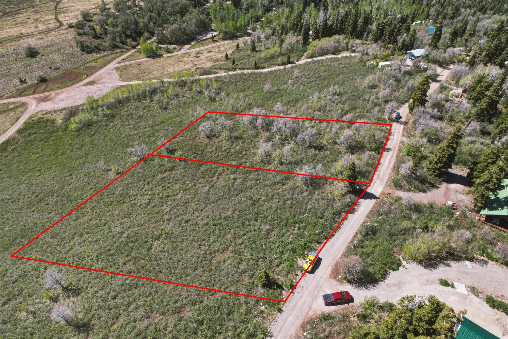 Expansive undeveloped lot with existing road frontage