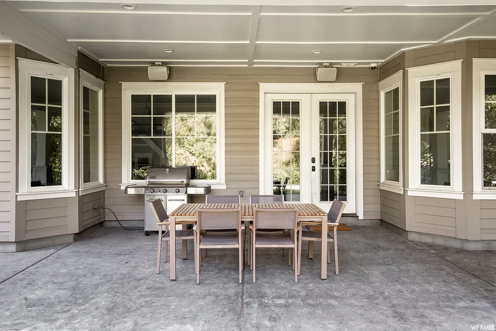 Covered patio featuring a concrete surface and recessed lighting