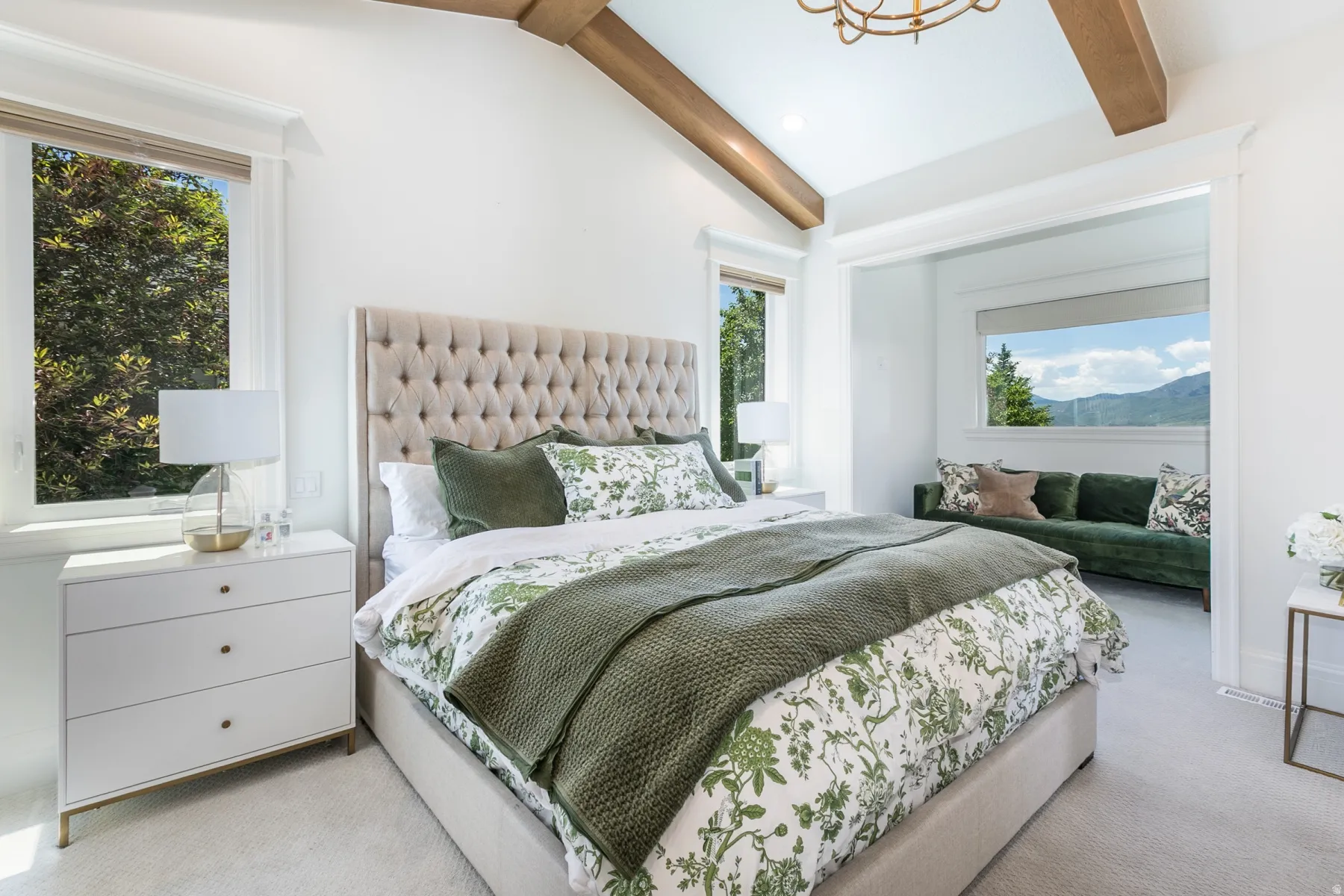 Vaulted ceilings featuring exposed wood beams
