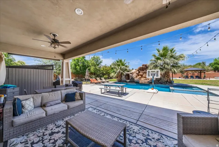 Covered patio featuring a ceiling fan and recessed lighting