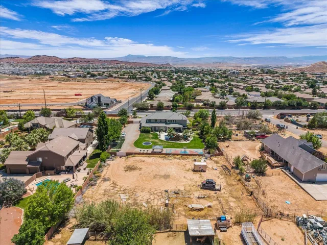 Expansive land parcel featuring open terrain and distant mountain scenery