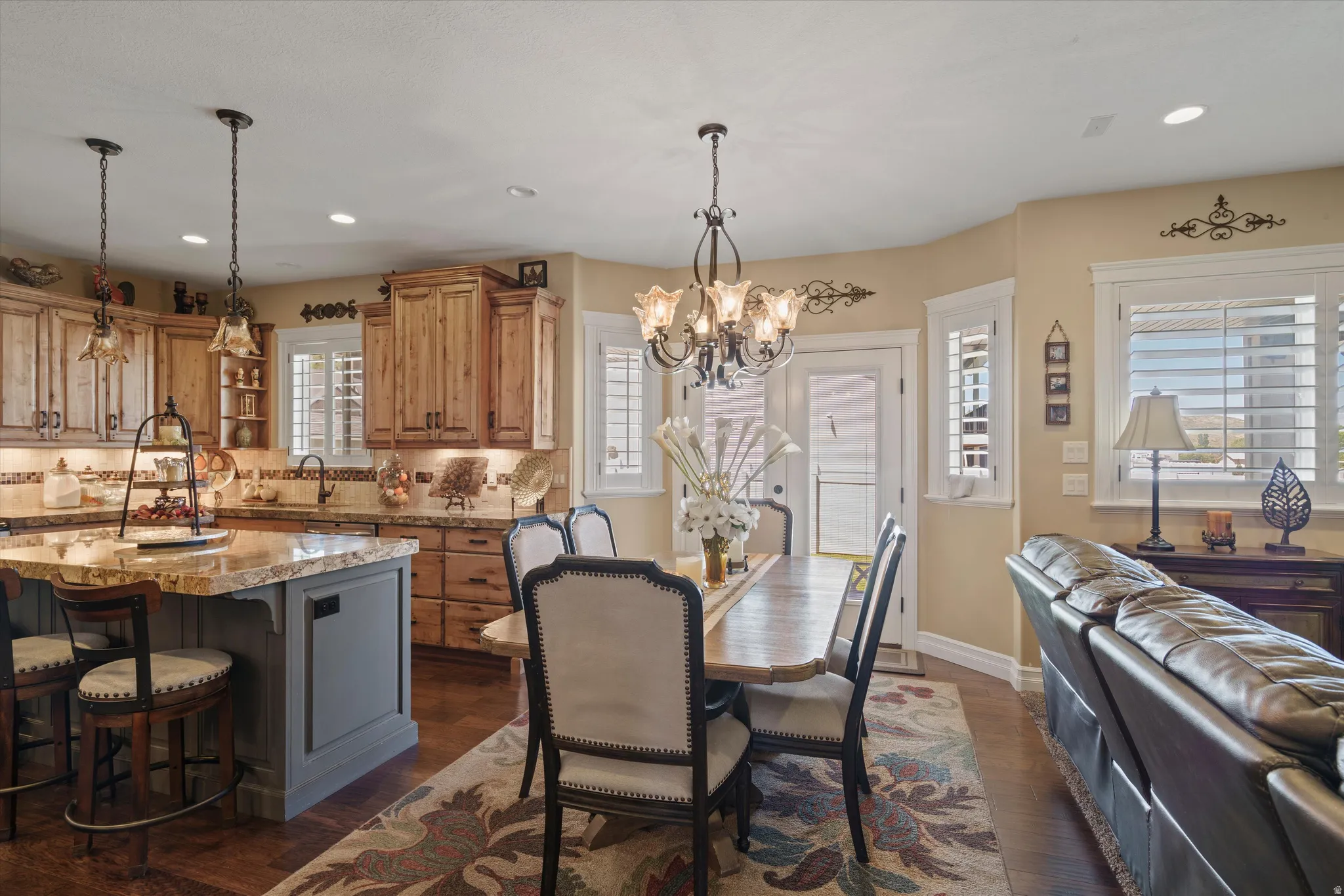 Open-concept living space featuring wood-finish flooring