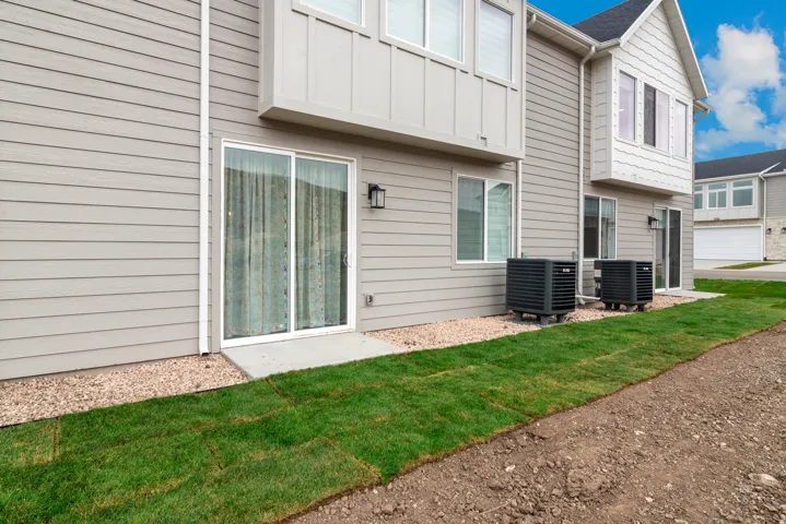 Sliding glass door entry to exterior patio