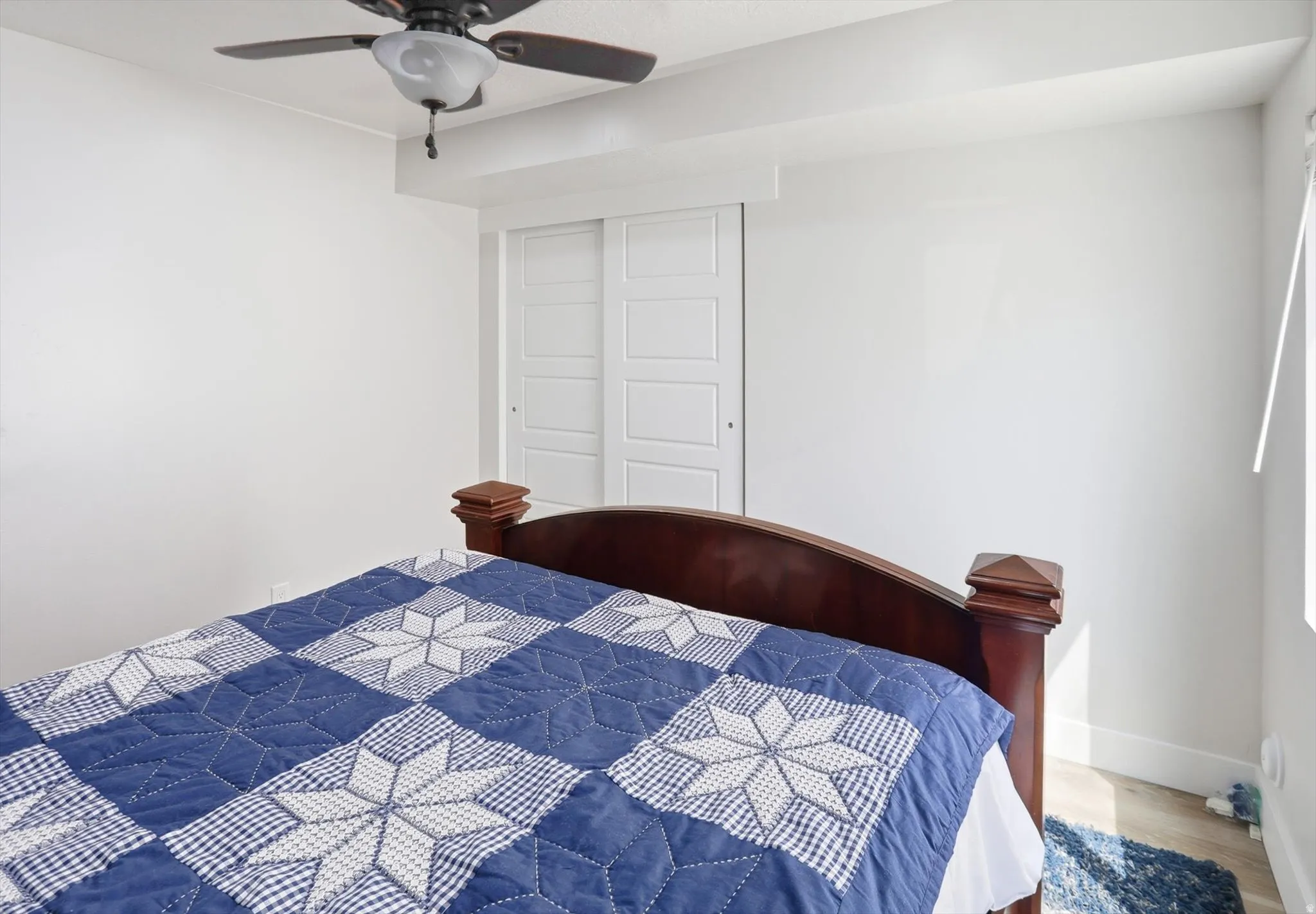 White walls with light wood-finish flooring