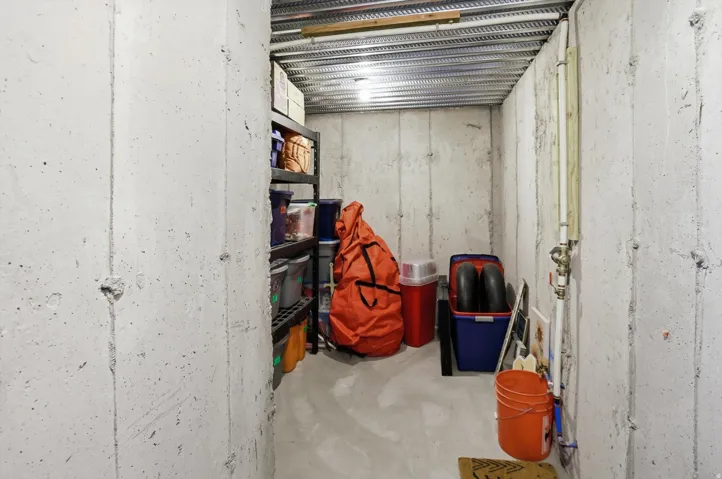 Concrete foundation walls and flooring provide a durable storage area